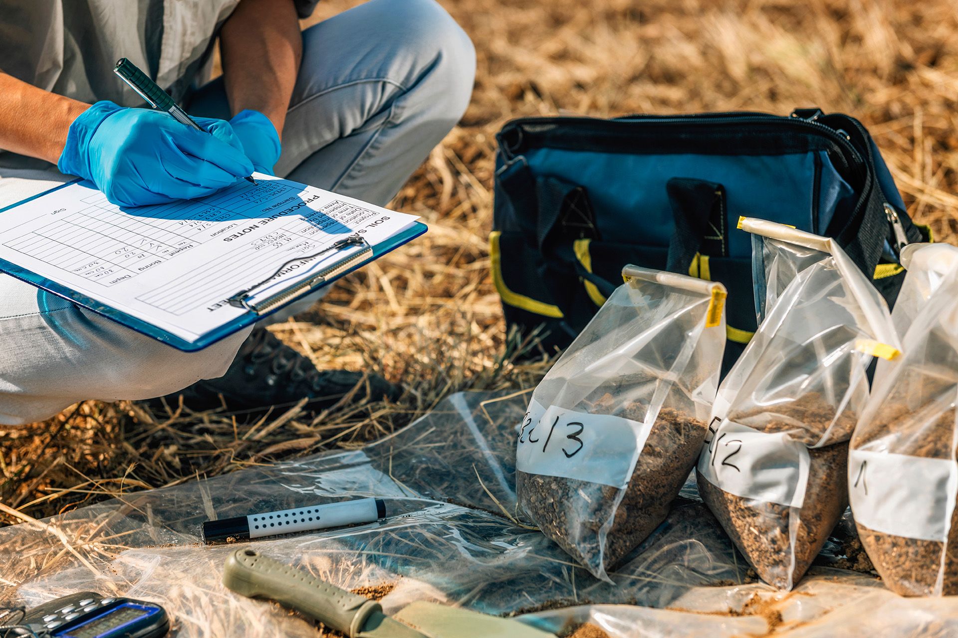 hydrogeological engineer collecting soil samples